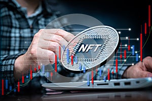 NFT concept image with a man using a laptop. NFT non-fungible token. Technology abstract