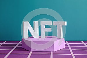 NFT on the podium as a minimum concept of a blockchain token for online