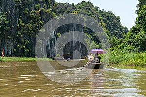 Ngo Dong river with tourism boat in Tam Coc, Ninh Binh, Vietnam