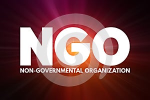 NGO - Non-Governmental Organization acronym, business concept background photo