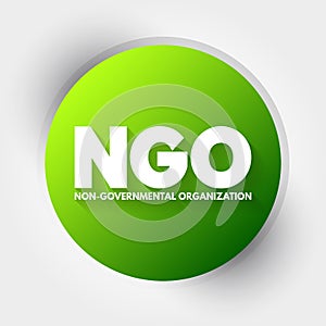 NGO - Non-Governmental Organization acronym, business concept background photo