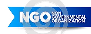 NGO - Non-Governmental Organization is an organization that generally is formed independent from government, acronym text concept photo