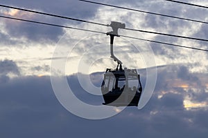 Ngong Ping 360 cable car on Tung Chung ,Lantau Island, Hong Kong. Cable car just leave the Tung Chung City.