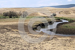 Ngorongoro - Tanzania - Dry grass landscape with river