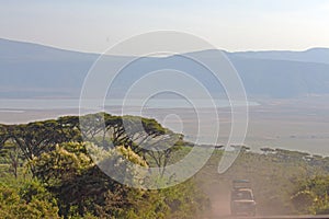 Ngorongoro View with a jeep in foreground.