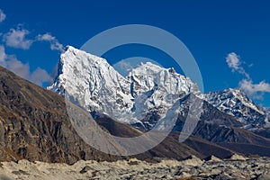 Ngozumpa glacier snow mountain peak in Himalaya