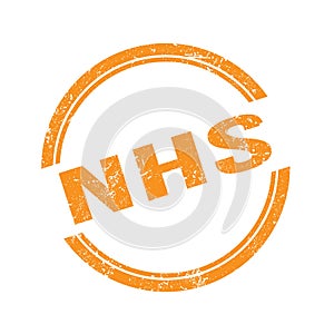 NHS text written on orange grungy round stamp