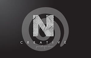 NI N I Letter Logo with Zebra Lines Texture Design Vector. photo