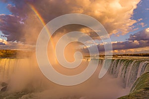 Niagara Falls lights up beautifully as the sun sets