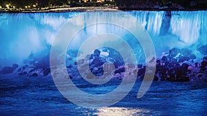 Niagara Falls with night lights. View from the Canadian coast. Timelapse video