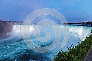 Niagara Falls seen at dusk from Canada