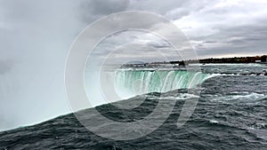 Niagara Falls. View of Horseshoe Falls from Table Rock in Queen Victoria Park in Niagara Falls. Bird flying over Niagara