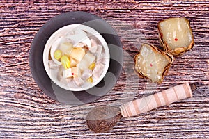 Nian gao dumplings and taro in coconut cream.