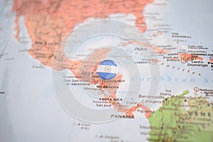 Nicaragua flag drawing pin on the map