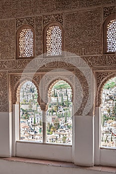 Nice arch windows in ancient Arabian palace Alhambra. Granada, Spain
