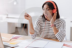 Nice beautiful woman listening to music