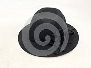 nice black wool hat with a flower
