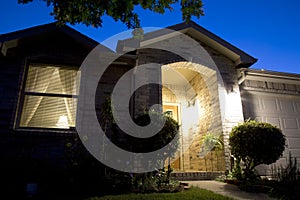 A nice brick house at night