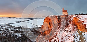 Nice Catholic Chapel in eastern Europe at winter landscape - village Drazovce