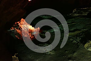 Cave with sunet light and colorful structures photo