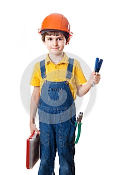 Nice child in hardhat with plastic box and screwdrivers