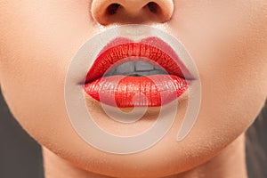 Nice close up woman lips with red lipstick