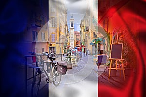 Nice colorful street architecture and church view on French flag overlay