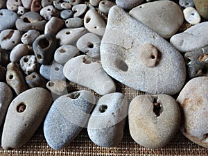 Nice different colors and shape stones with hole, Lithuania
