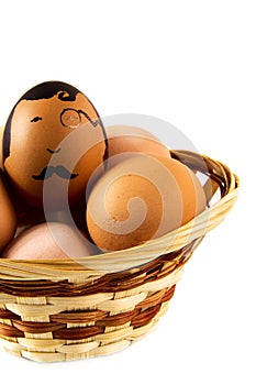 Nice eggs in basket with hipster face