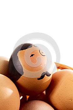 Nice eggs in basket with hipster face