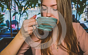 Nice Elegant Lady With Coffee Cup In Her Hands