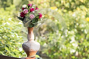 Nice flowers in the antique vase pot