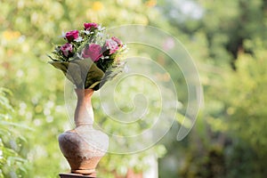 Nice flowers in the antique vase pot