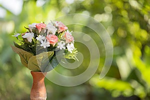 Nice flowers in the antique vase pot