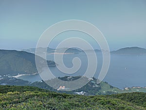 Nice fog and very hot weather view in Hong Kong Sai Kung Dragon& x27;s back shek O peak photo