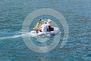 Nice , France - 7 august 2017 : small inflatable boat used to carry people from the beach to boats moored off the sea