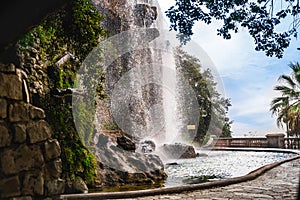 Nice France. Waterfall in Park de la Colline du Chateau. Scenery view of  Waterfall of Castle Hill. Cote d`Azur France