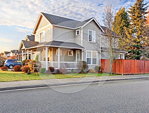 nice front yard with porch and walkway.nice front yard with porch, grass, and walkway.