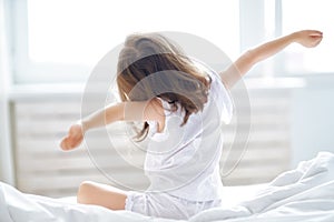 Child is waking up from sleep photo