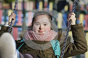 Nice girl having fun on the playground