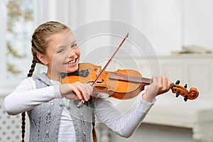 Nice girl playing the violin