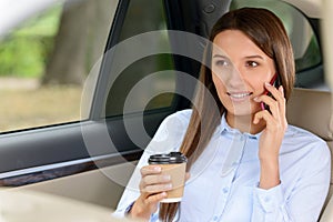 Nice girl sitting in the car