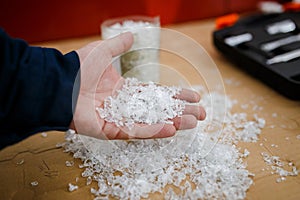 Granules recycled in the factory from plastic bottles photo