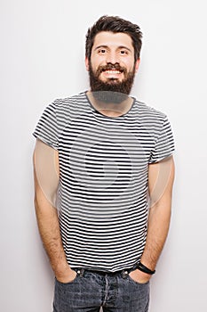 Nice handsome young man with beard full heigh photo