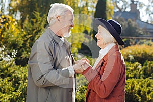 Nice happy aged couple looking at each other