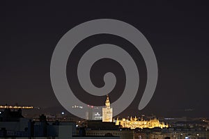 Nice image of the cathedral of Seville and its Giralda seen from the top of the town of Camas