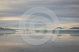 Nice image of the fog over the fjord in Kristiansand, with the Varodd bridge in the background.