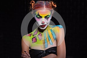 Nice lady with a face painting clown