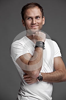 Nice likeable guy on white background photo