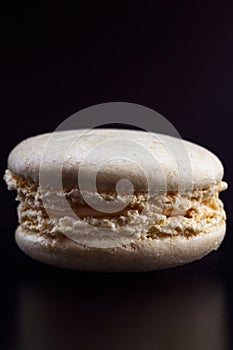 Nice macaroon on black background